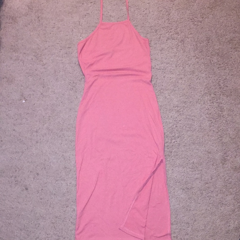 Halter dress with split at the slide.